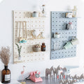 Beige Wall-Mounted Pegboard Storage Rack